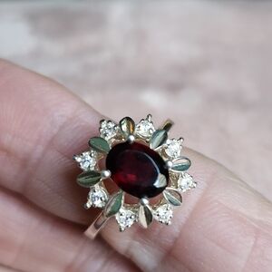 Elegant Sterling Silver And Garnet Ring